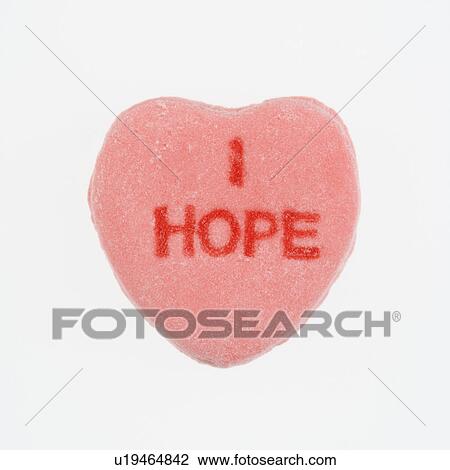 Pink candy heart that reads I hope against white background. View Large Photo Image Stock Image - Pink candy heart that reads I hope against white background.. Fotosearch