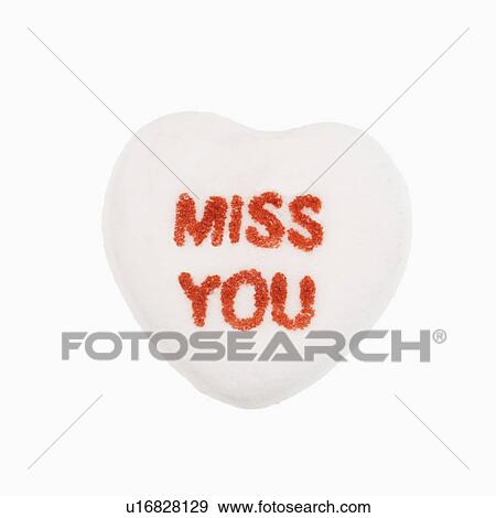 White candy heart that reads miss you against white background. View Large Photo Image Stock Photo - White candy heart that reads miss you against white background.. Fotosearch