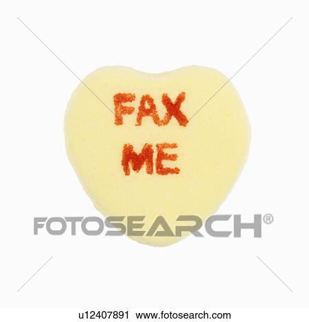Yellow candy heart that reads fax me against white background. View Large Photo Image Stock Image - Yellow candy heart that reads fax me against white background.. Fotosearch