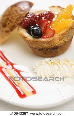 Fresh fruit stuffed brioche with vanilla anglaise. View Large Photo Image Stock Photo - Fresh fruit stuffed brioche with vanilla anglaise.. Fotosearch