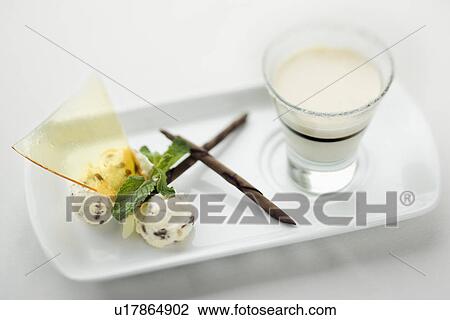 Stock Image - Still life of gourmet dessert with professional presentation.. Fotosearch