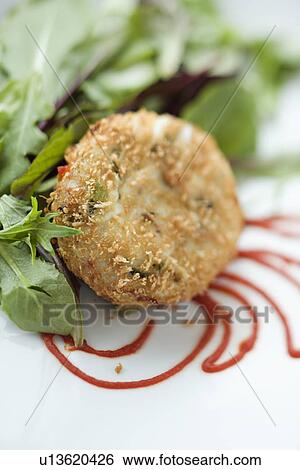 Stock Photograph - Still life of gourmet dessert with professional presentation.. Fotosearch