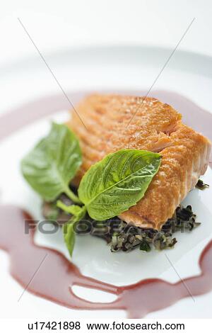 Still life of gourmet salmon meal with professional presentation. View Large Photo Image Stock Photo - Still life of gourmet salmon meal with professional presentation.. Fotosearch
