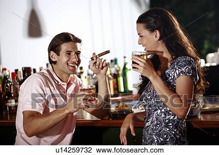Stock Image - Couple in a bar. Fotosearch