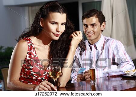 Stock Image - Couple in a bar. Fotosearch