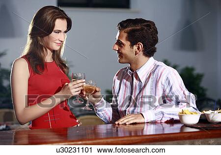 Couple in a bar View Large Photo Image Stock Image - Couple in a bar. Fotosearch