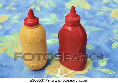 Bottles of ketchup and mustard View Large Photo Image Stock Photo - Bottles of ketchup and mustard. Fotosearch