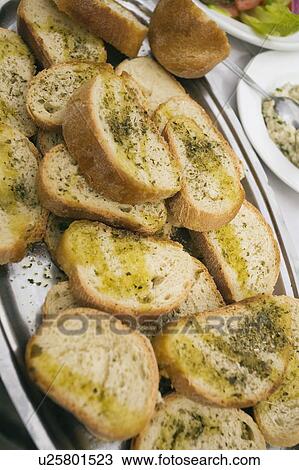 Grilled bread with olive oil and oregano View Large Photo Image Stock Image - Grilled bread with olive oil and oregano. Fotosearch
