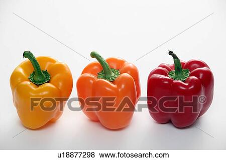 Stock Photo - Three fresh bell peppers. Fotosearch