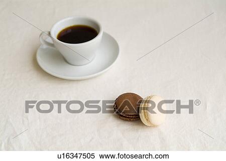 Stock Photography - Cup of coffee and macaroon. Fotosearch