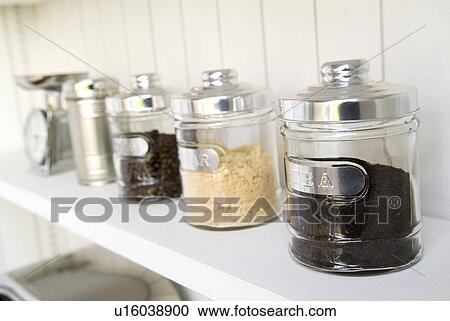 Glass jars aligned View Large Photo Image Stock Image - Glass jars aligned. Fotosearch