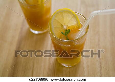 Stock Photograph - Iced orange tea. Fotosearch