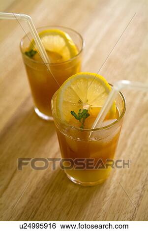 Iced orange tea View Large Photo Image Stock Photograph - Iced orange tea. Fotosearch