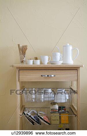 Storage rack in kitchen View Large Photo Image Stock Photograph - Storage rack in kitchen. Fotosearch