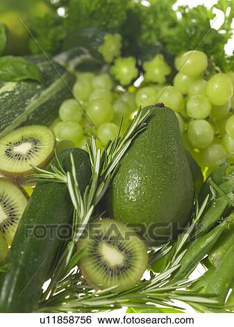 Stock Photograph - Assorted green fruits and vegetables. Fotosearch