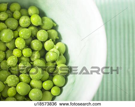 Stock Photograph - Peas in a bowl. Fotosearch