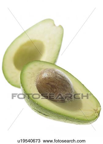 Stock Image - Avocado cut in half. Fotosearch