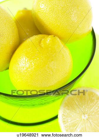 Stock Image - Fresh lemons in a bowl. Fotosearch