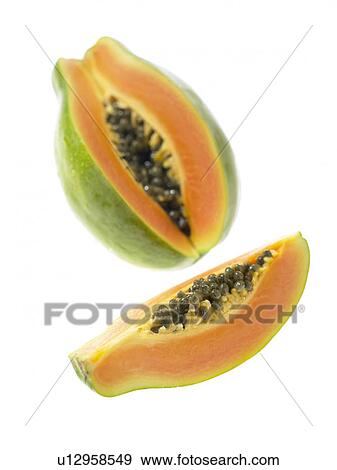 Stock Photo - One Papaya with a slice cut out. Fotosearch