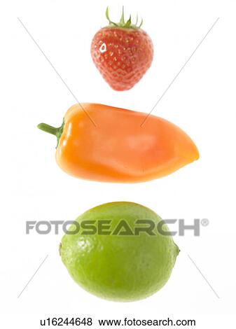 Stock Photo - One strawberry one lime and one pepper. Fotosearch