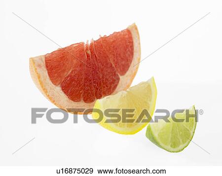 Stock Photo - Single slices of Lemon, Lime and Blood Orange. Fotosearch