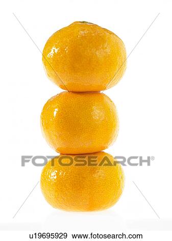Three stacked Satsuma fruit View Large Photo Image Stock Photo - Three stacked Satsuma fruit. Fotosearch