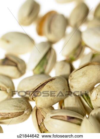 Stock Image - Pile of pistachio nuts. Fotosearch