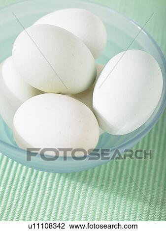 Stock Image - Six Eggs in a bowl. Fotosearch