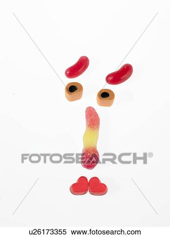 Assorted Sweets placed to make a face View Large Photo Image Stock Photography - Assorted Sweets placed to make a face. Fotosearch