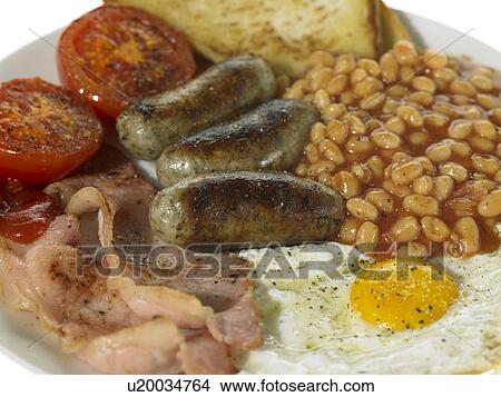 British Breakfast, Bacon, Eggs, Sausage, Beans, Tomato View Large Photo Image Picture - British Breakfast, Bacon, Eggs, Sausage, Beans, Tomato. Fotosearch