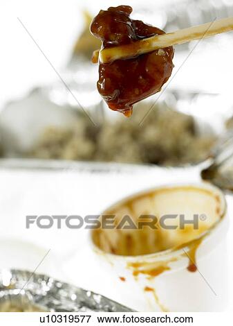Stock Photo - Chinese Takeaway meal and chopsticks. Fotosearch