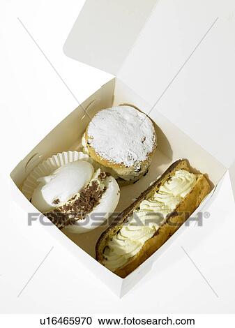 Stock Image - Cream Cakes in takeout. Fotosearch