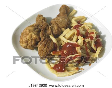 Fried chicken and French fried chips View Large Photo Image Stock Image - Fried chicken and French fried chips. Fotosearch