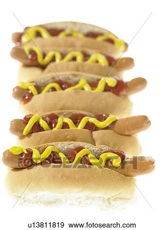 Hot dogs with toppings View Large Photo Image Stock Photo - Hot dogs with toppings. Fotosearch