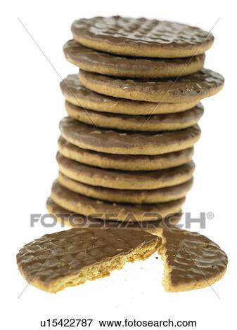 Stock Photo - Stack of chocolate biscuits with one broken in half. Fotosearch
