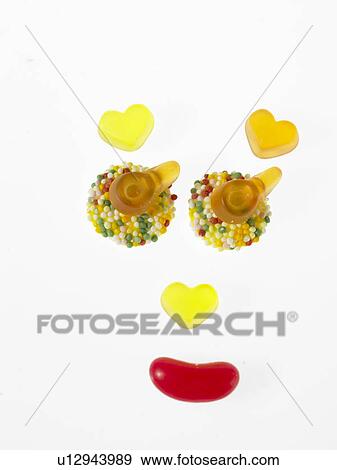 Sweets placed to make a face View Large Photo Image Stock Photo - Sweets placed to make a face. Fotosearch