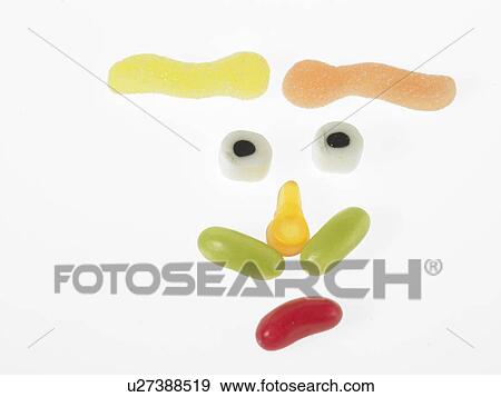 Sweets placed to make a face View Large Photo Image Stock Photo - Sweets placed to make a face. Fotosearch