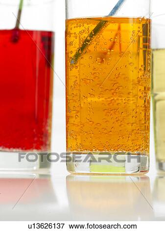 Three Glasses of fizzy drinks with straws View Large Photo Image Stock Photo - Three Glasses of fizzy drinks with straws. Fotosearch