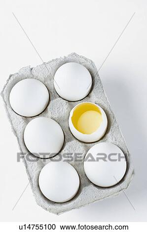 Close-up of a broken egg in an egg carton View Large Photo Image Stock Image - Close-up of a broken egg in an egg carton. Fotosearch