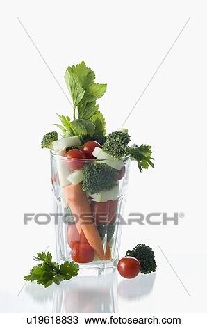 Stock Image - Close-up of a glass full of vegetables. Fotosearch