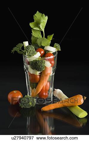 Stock Photo - Close-up of a glass full of vegetables. Fotosearch