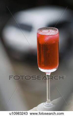 Stock Image - Close-up of a glass of cocktail. Fotosearch