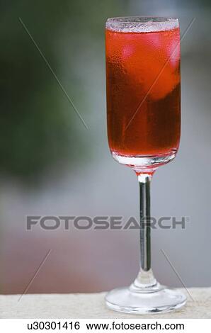 Stock Photograph - Close-up of a glass of cocktail. Fotosearch