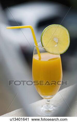 Stock Image - Close-up of a glass of juice. Fotosearch