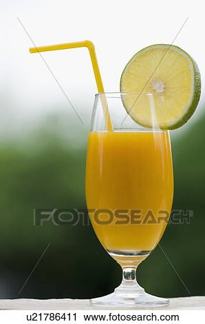 Stock Image - Close-up of a glass of juice. Fotosearch