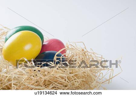 Close-up of Easter eggs in a bird's nest View Large Photo Image Picture - Close-up of Easter eggs in a bird's nest. Fotosearch