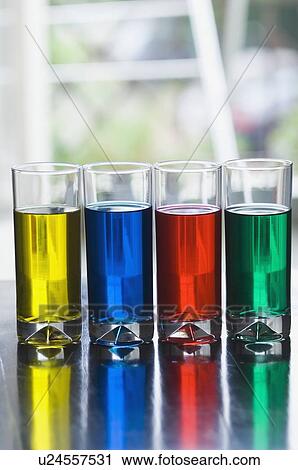 Stock Image - Close-up of four glasses of mocktail. Fotosearch