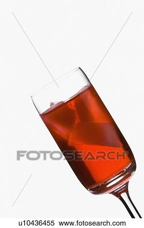 Close-up of ice cubes in a glass of cocktail View Large Photo Image Stock Photography - Close-up of ice cubes in a glass of cocktail. Fotosearch