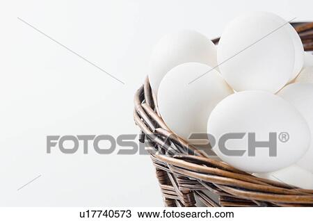 Eggs in a basket View Large Photo Image Stock Image - Eggs in a basket. Fotosearch