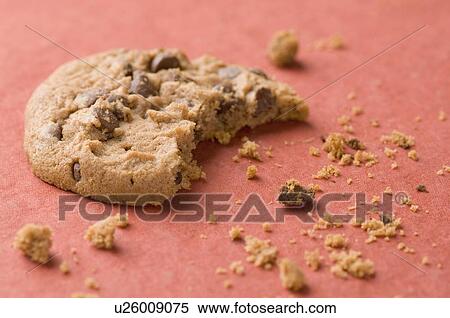Stock Photography - Close-up of a broken brown biscuit. Fotosearch